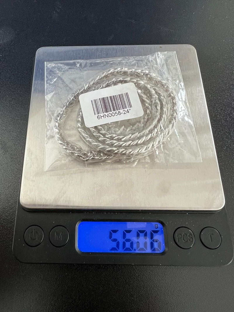 Men's Moissanite Real Cuban Curb Link Chain on scale showing 56 grams.