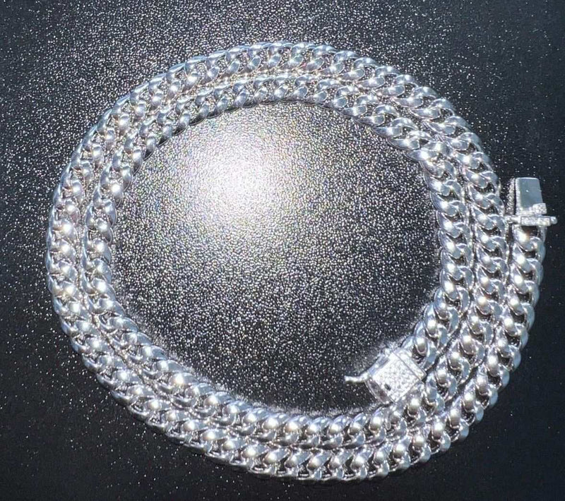 Men's Moissanite Real Cuban Curb Link Chain Hip Hop Solid 925 Silver Necklace on black surface.
