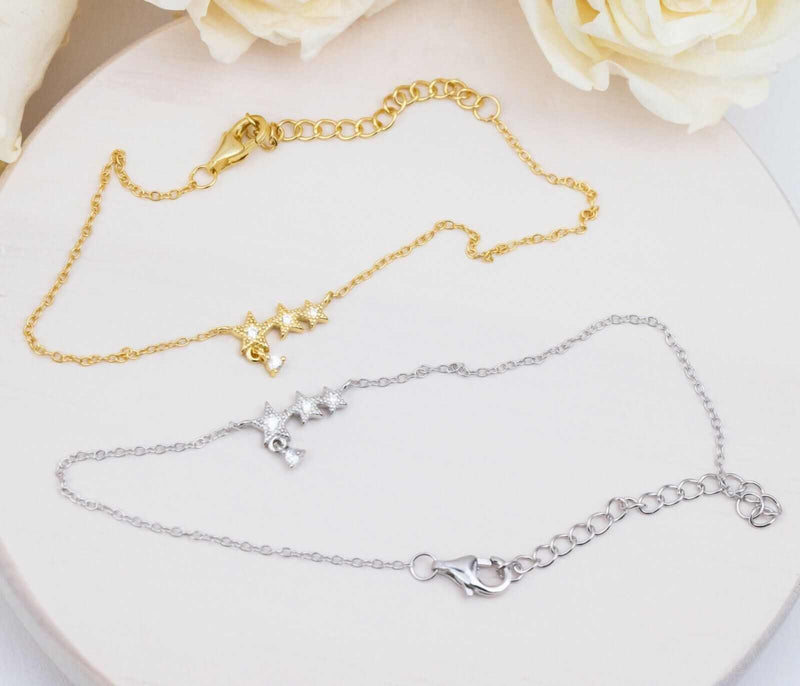Stars bracelet in 925 sterling silver, 14K gold plated with tiny charm design.