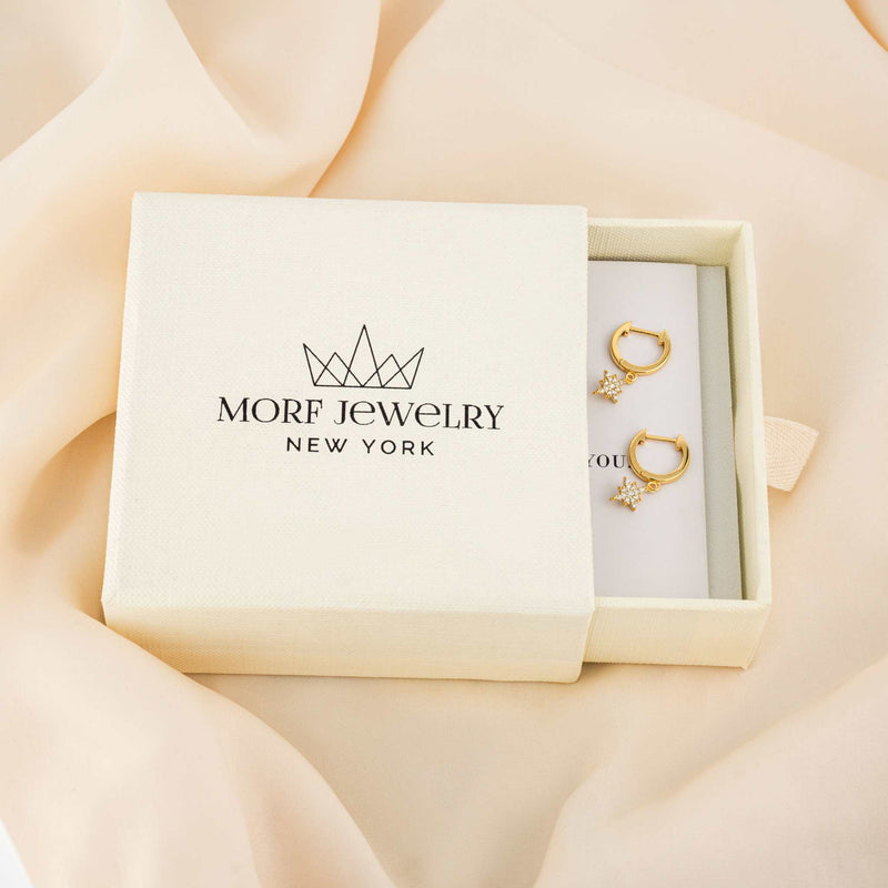 Stellar Starburst Earrings in 14K gold with CZ stones in Morf Jewelry box.