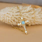 Sterling silver cross Jesus bracelet with 18K gold plating and cable chain design.