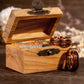 Guitar String Whiskey Barrel Ring in rose gold and tungsten with olive wood box.