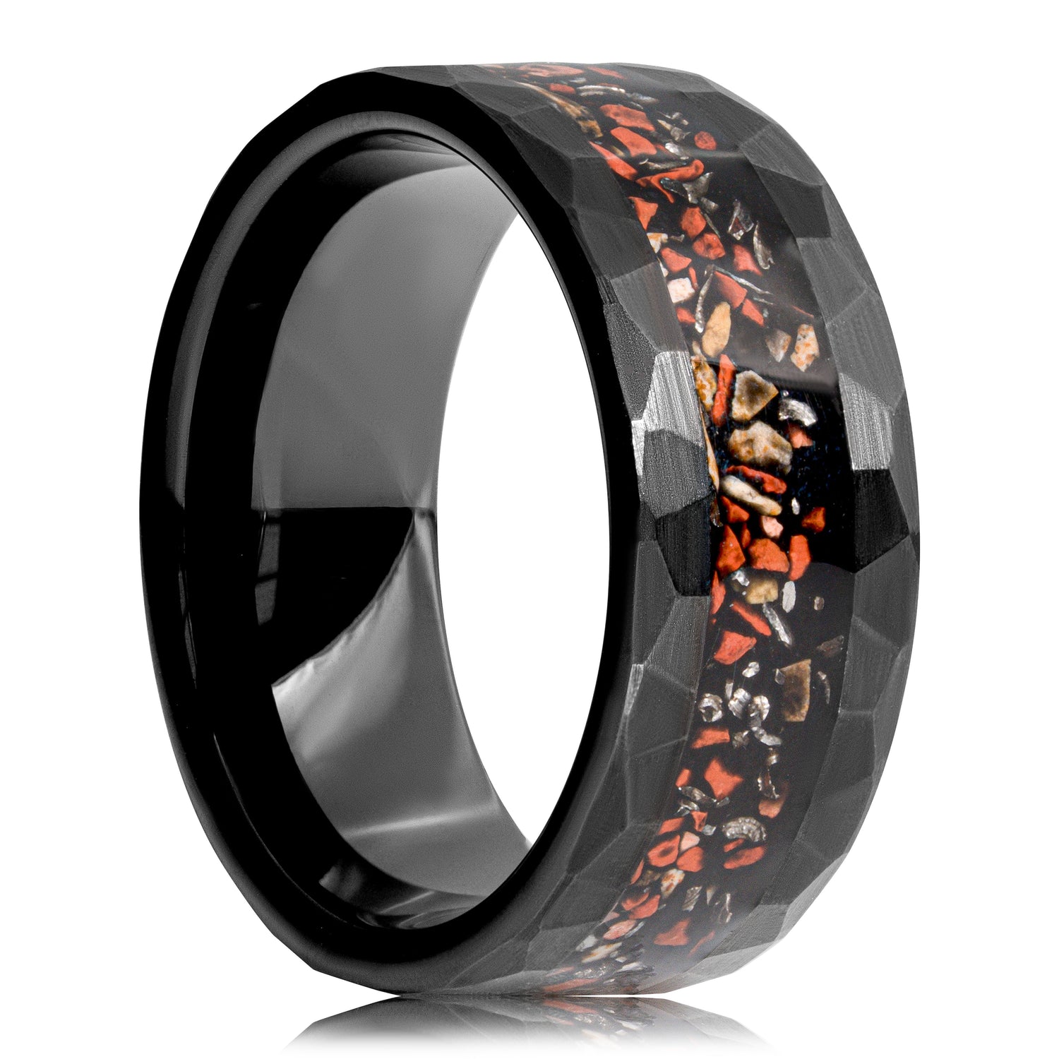 Black tungsten ring with dinosaur bone and meteorite inlay, featuring a unique hammered design.