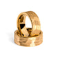 Handcrafted tungsten hammered gold wedding ring with rustic charm.