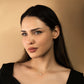 Marquise Flower Necklace with floral marquise diamond design on a woman, 14k gold over brass.