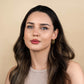 Mirage Twisted Hoop Earrings in 18k PVD gold plating worn by model.