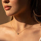 Nacre Flower Necklace with Mother-of-Pearl pendant on a dainty gold-dipped chain.