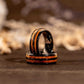 Tungsten and wood whiskey barrel ring with 8mm width, featuring a sleek design and unique wood inlay.
