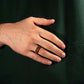Whiskey Barrel Ring with wood inlay and black tungsten, 8mm width, worn on hand.