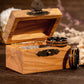 Tungsten and wood whiskey barrel ring in wooden box.